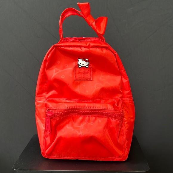hello kitty herschel mini backpack X Satin Hello Kitty was introduced in Japan as a highly popular coin purse Hello Kitty x Herschel Mini